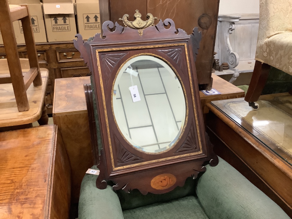 A George III style inlaid parcel gilt mahogany fret cut wall mirror, width 60cm, height 84cm